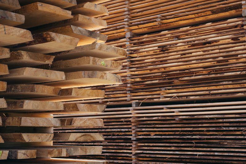 Sawn timber boards stacked to dry